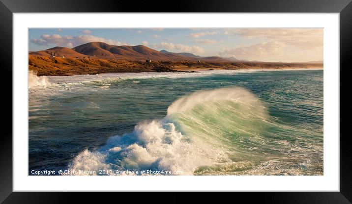 Wind blowing the surf at El Cotillo Fuerteventura  Framed Mounted Print by Chris Warren