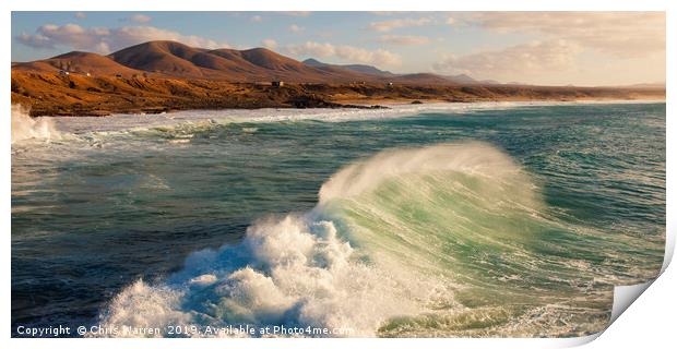 Wind blowing the surf at El Cotillo Fuerteventura  Print by Chris Warren