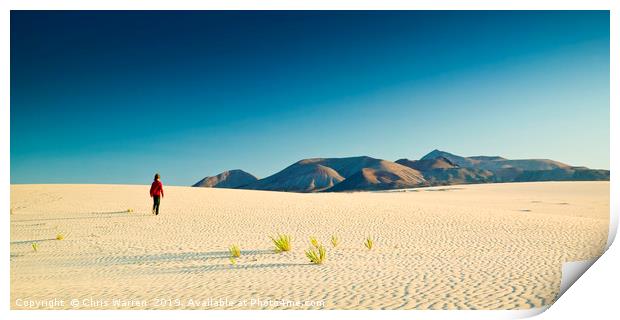 A lone figure walking on Sand dunes Corralejo  Print by Chris Warren