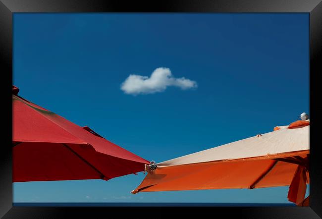 A solo cloud and parasols Framed Print by Leighton Collins