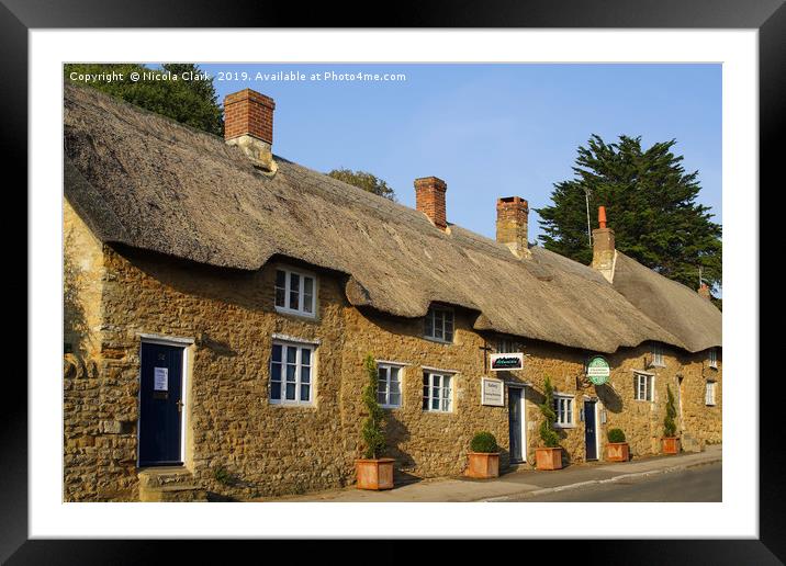Thatched Cottages Framed Mounted Print by Nicola Clark