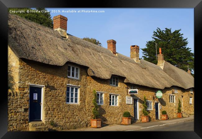 Thatched Cottages Framed Print by Nicola Clark