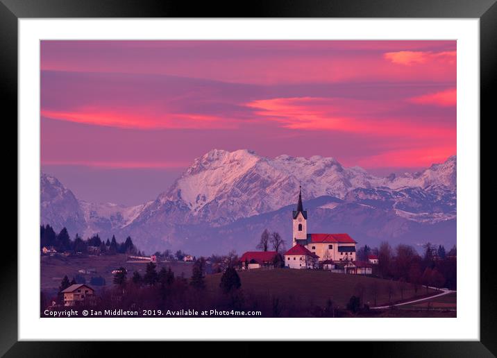 Prezganje church with snowy Kamnik Alps at sunset Framed Mounted Print by Ian Middleton