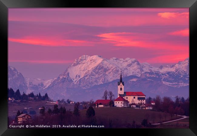 Prezganje church with snowy Kamnik Alps at sunset Framed Print by Ian Middleton
