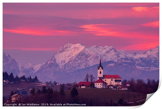 Prezganje church with snowy Kamnik Alps at sunset Print by Ian Middleton