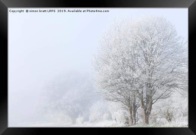 Winter landscape in Norfolk England with frozen fo Framed Print by Simon Bratt LRPS