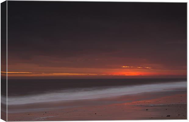 Red sky in morning Canvas Print by Simon Wrigglesworth