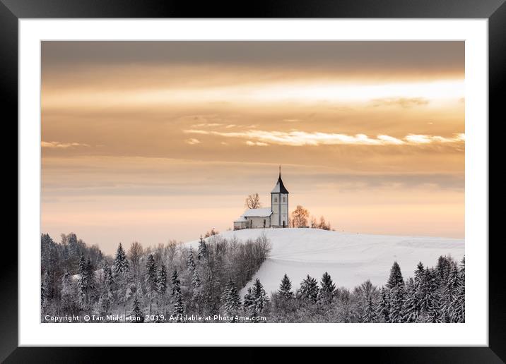 Winter sunrise at Jamnik church of Saints Primus a Framed Mounted Print by Ian Middleton