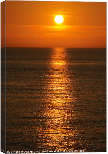 Sunset reflections Canvas Print by Ant Marriott