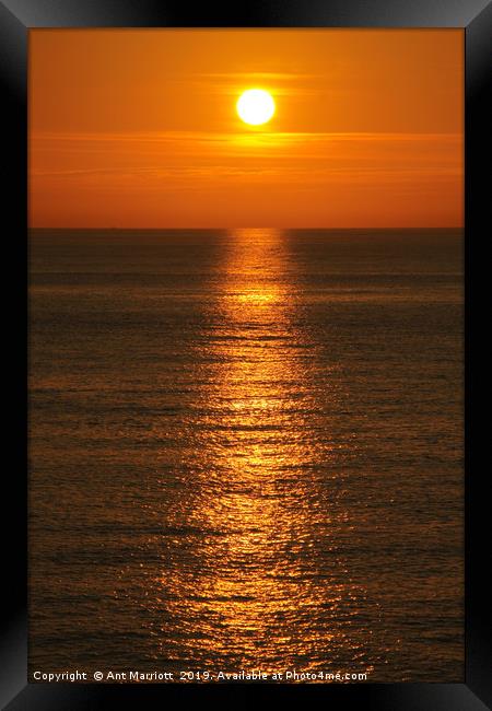 Sunset reflections Framed Print by Ant Marriott