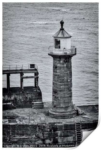 Whitby pier lighthouse Print by Graham Moore