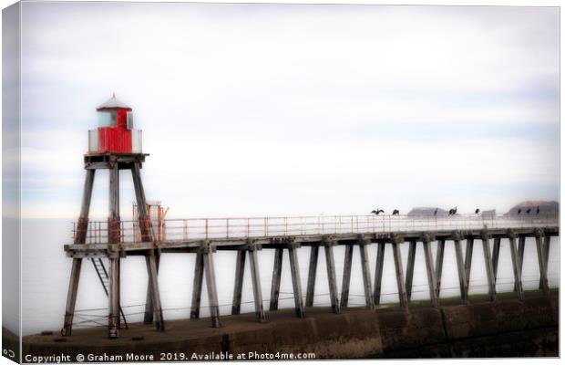 Whitby harbour pier Canvas Print by Graham Moore