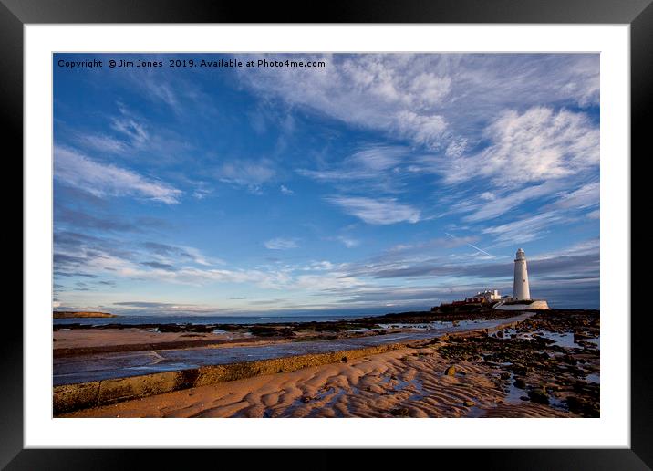 St Mary's Island at low tide. Framed Mounted Print by Jim Jones