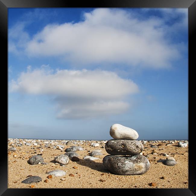 Three Clouds ... Three Pebbles ... Framed Print by Dave Turner