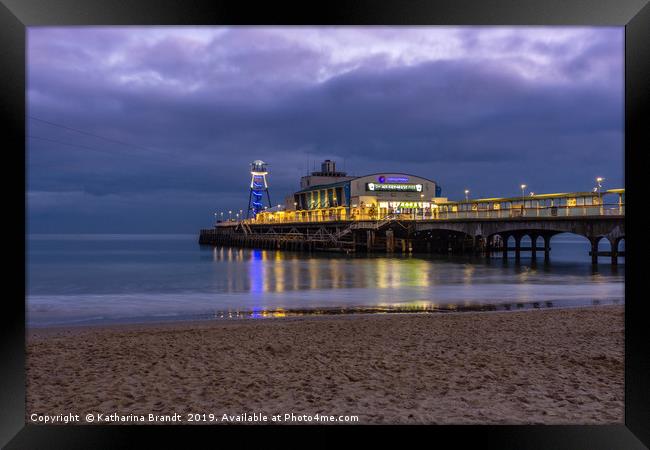 Bournemouth Pier illuminated at night Framed Print by KB Photo
