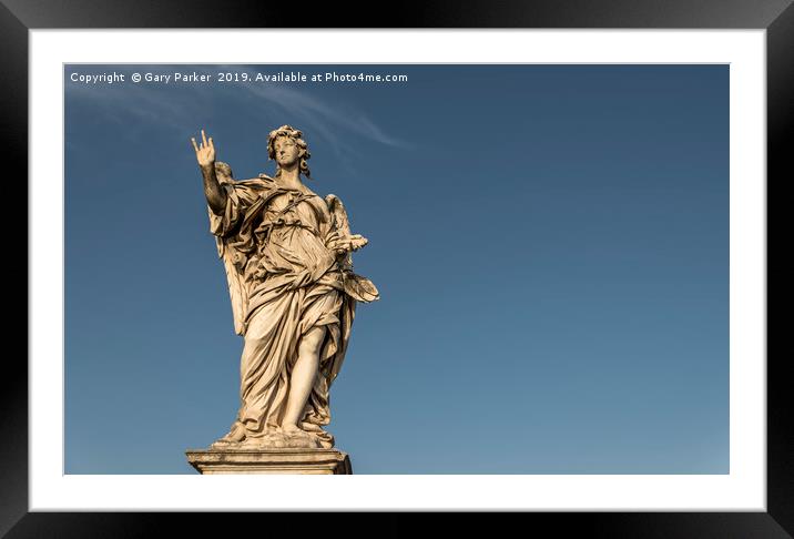A large, stone statue of an angel, Rome Framed Mounted Print by Gary Parker