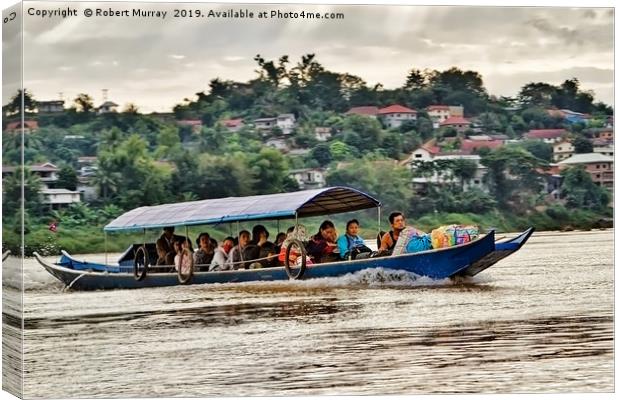 Crossing the Mighty Mekong Canvas Print by Robert Murray