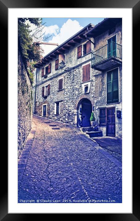 Alley in alpine village Framed Mounted Print by Claudio Lepri