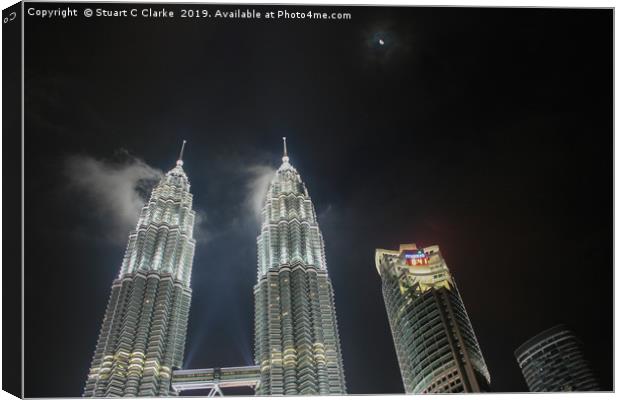 Misty Petronas Towers Canvas Print by Stuart C Clarke