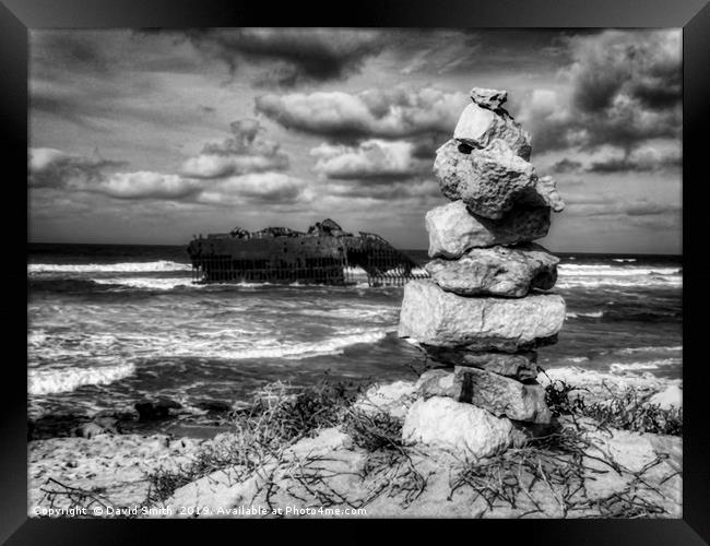 Rocks And Wrecks                     Framed Print by David Smith