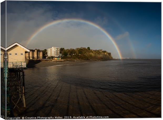 Rainbow over Penarth Pier Canvas Print by Creative Photography Wales