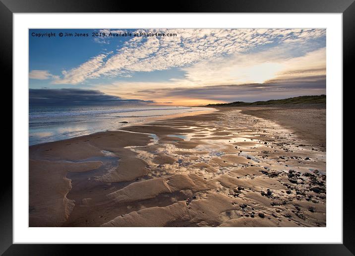Morning sky reflected on the beach. Framed Mounted Print by Jim Jones