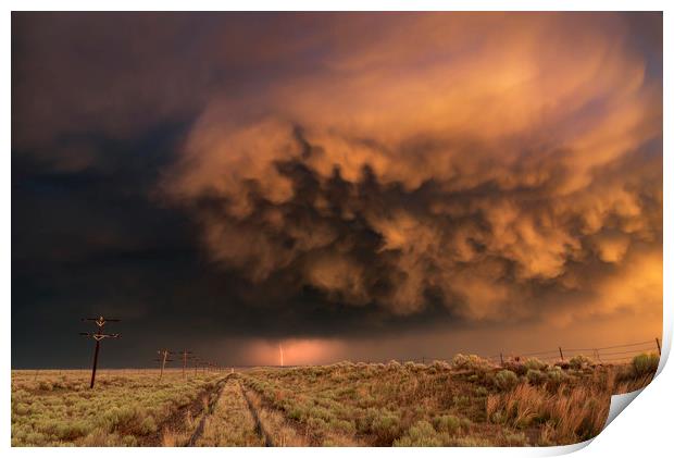 Distant Lightning with sunset storm clouds Print by John Finney