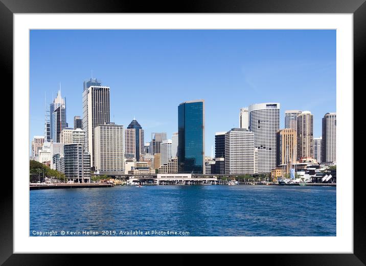 Sydney central business district from the harbour  Framed Mounted Print by Kevin Hellon