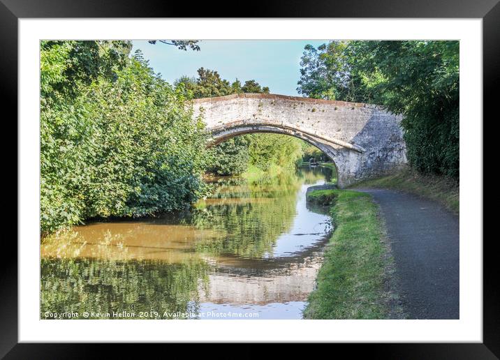 Bridge with reflection over the Shropshire Union c Framed Mounted Print by Kevin Hellon