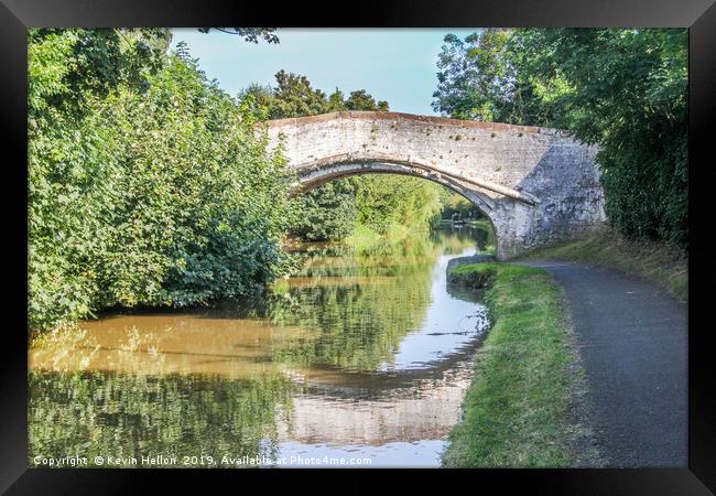 Bridge with reflection over the Shropshire Union c Framed Print by Kevin Hellon