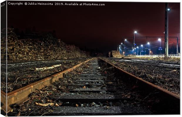 Railroad Tracks To The Horizon Canvas Print by Jukka Heinovirta