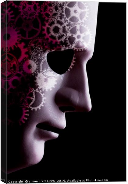 A.I. robotic face close up with cogs Canvas Print by Simon Bratt LRPS