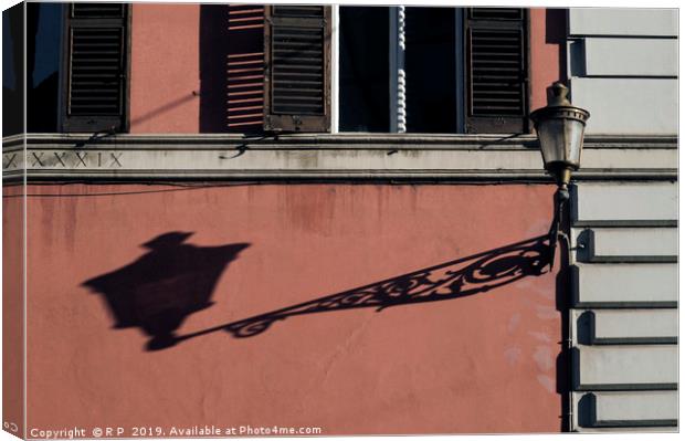 A street light in Rome throwing a long shadow Canvas Print by Lensw0rld 