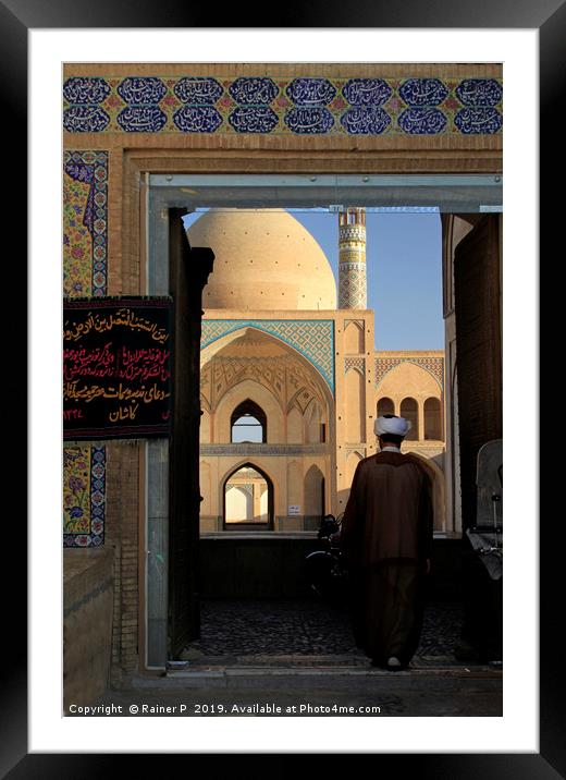 A man enters Agha Bozorg mosque Framed Mounted Print by Lensw0rld 