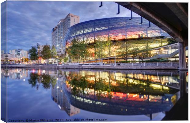 Ottawa convention centre and Rideau Canal Canvas Print by Martin Williams