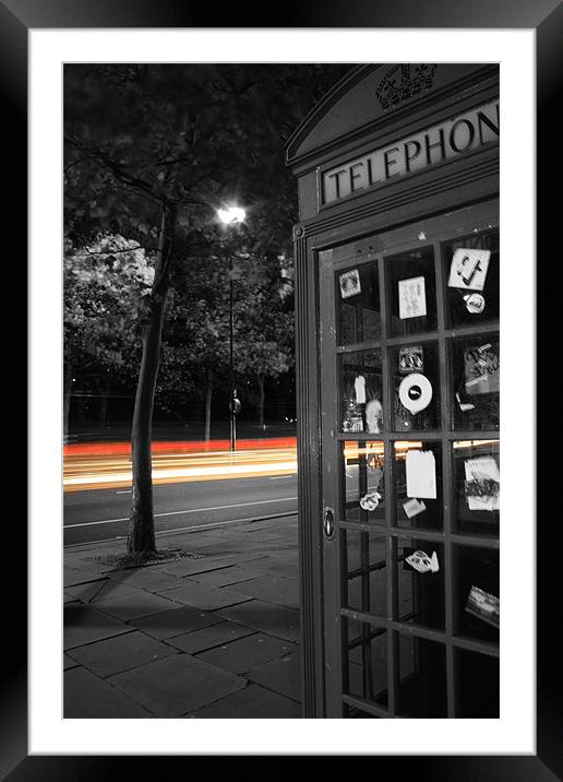 London Telephone box with trail of lights Framed Mounted Print by Sarah Waddams