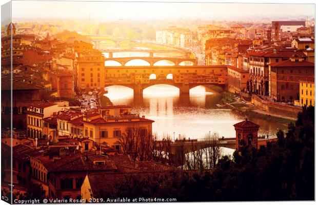sunset over Ponte Vecchio in Florence Canvas Print by Valerio Rosati