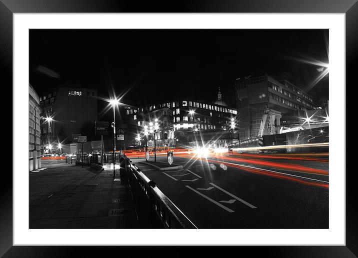 London busy road in trail of lights Framed Mounted Print by Sarah Waddams