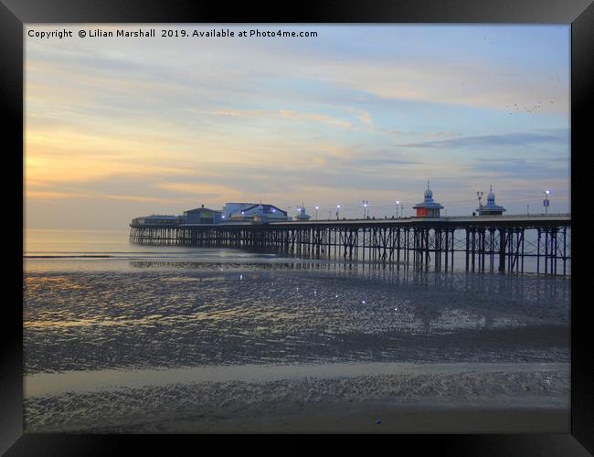 Sunset over North Pier. Blackpool in Lancashire.  Framed Print by Lilian Marshall