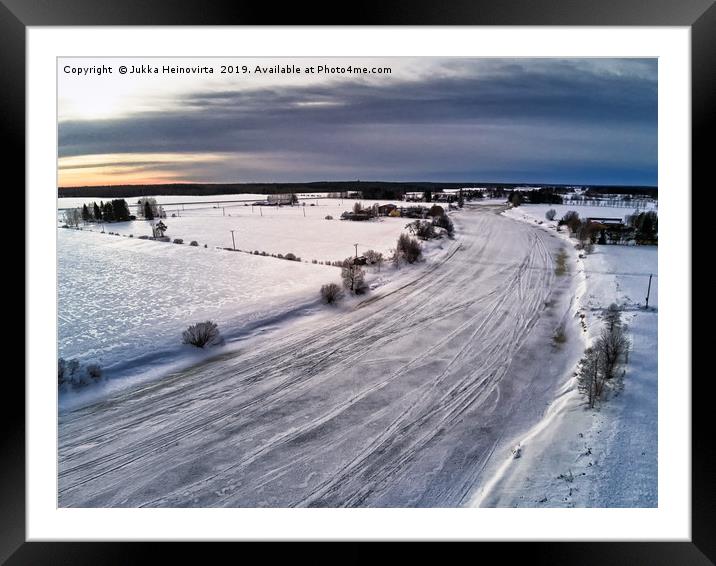 Aerial View Of The Icy River Framed Mounted Print by Jukka Heinovirta