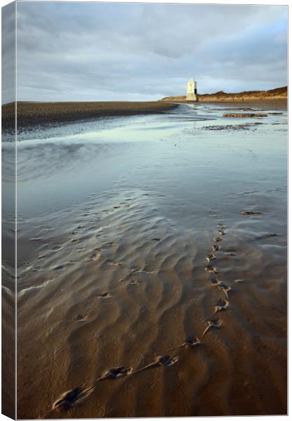 Footprints to the Low Lighthouse Canvas Print by David Neighbour