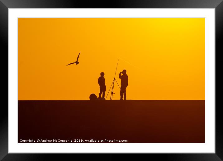 Fishing at Sunset Framed Mounted Print by Andrew McConochie
