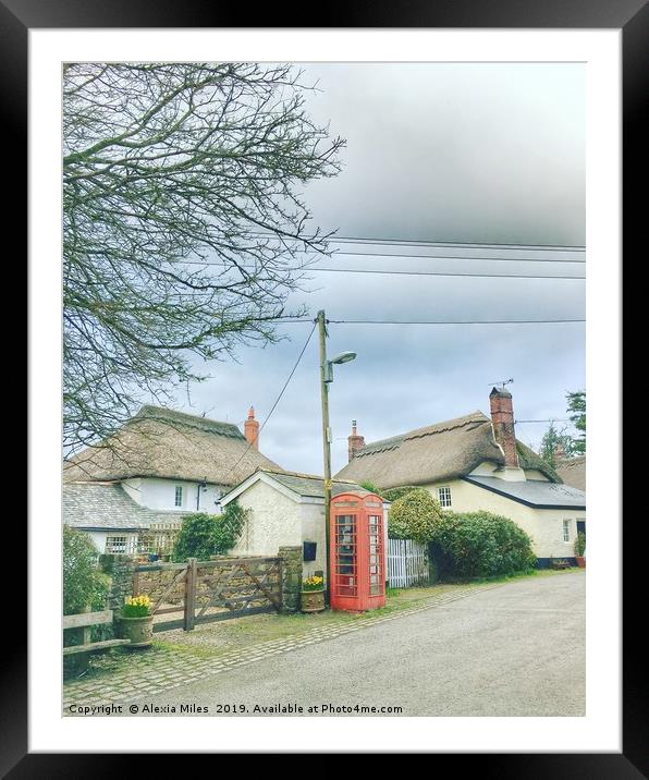 Phone box and cottages Framed Mounted Print by Alexia Miles