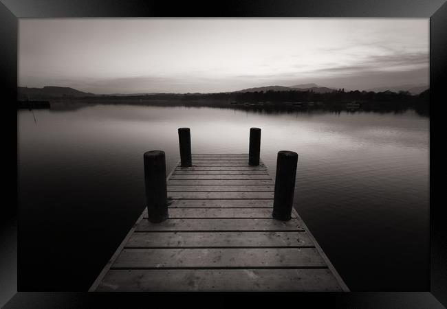Wooden pier and lake Windermere Framed Print by Jonathan Tallon