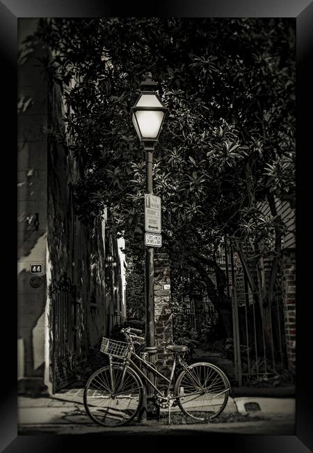 Bicycle Chained to Black Lamp Post Framed Print by Darryl Brooks