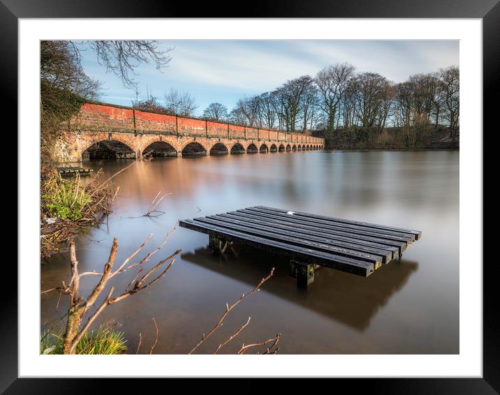 Carr Mill Dam and the 19 Arch Bridge  Framed Mounted Print by Andrew George