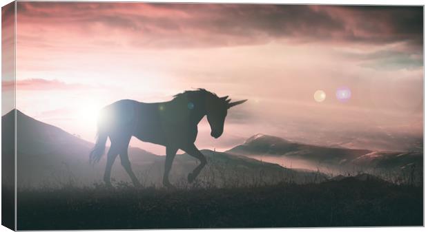 Unicorn silhouette at sunset Canvas Print by Guido Parmiggiani