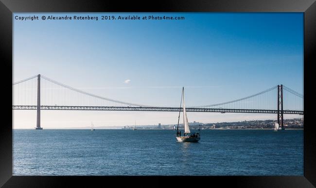 Sailboat with April 24 Bridge, Lisbon Framed Print by Alexandre Rotenberg