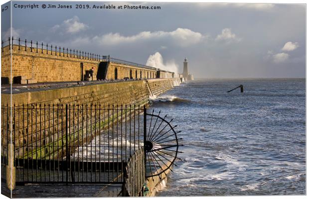 Waves crashing over Tynemouth Pier. Canvas Print by Jim Jones