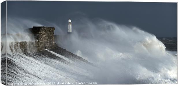 Porthcawl Lighthouse Amidst Winter's Fury. Canvas Print by Philip Veale